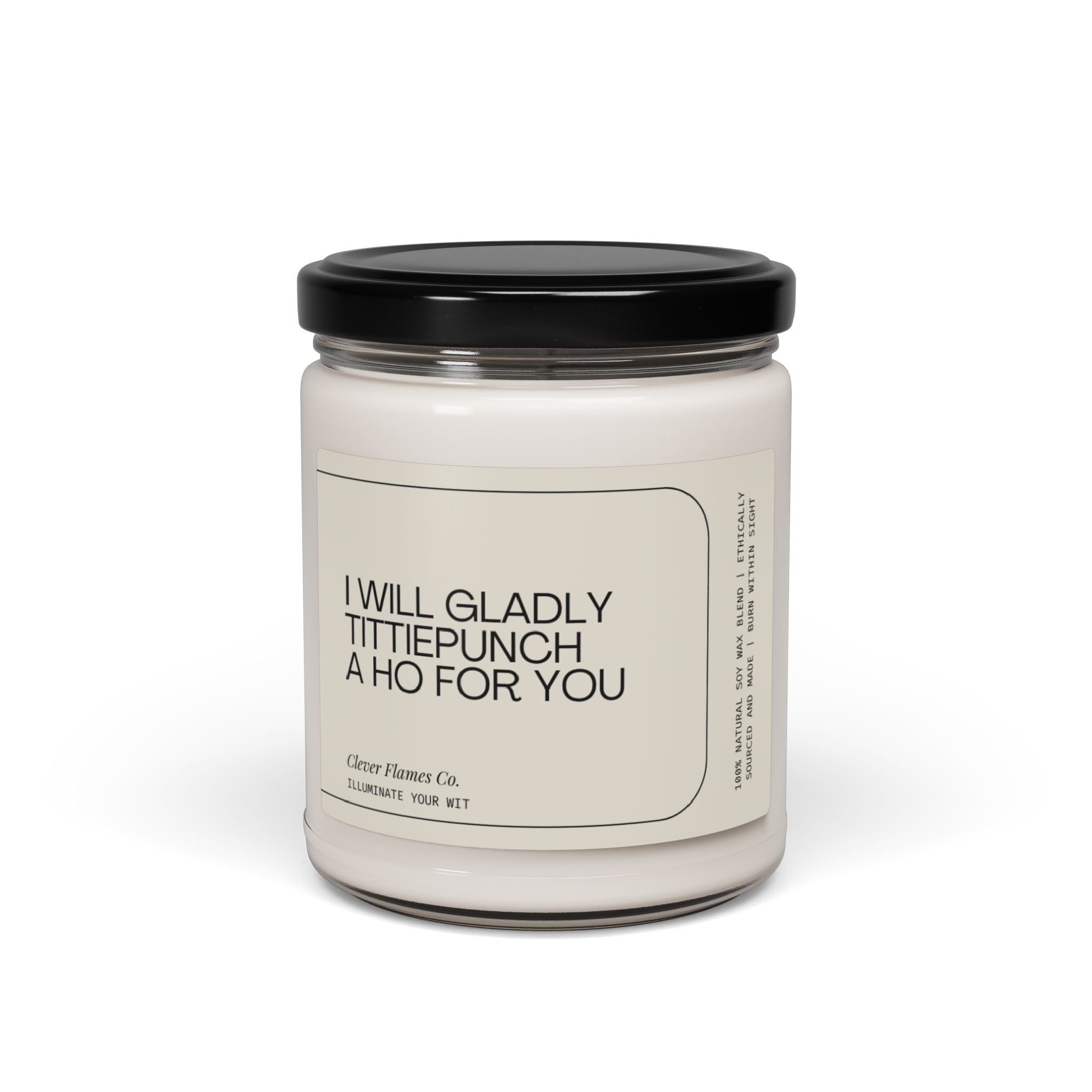 A sarcastic gift, this white candle comes in a glass jar with a black lid and features the humorous message "I Will Gladly Tittiepunch a Ho For You." The label's bottom reads, "Printify," and it's crafted from natural soy wax. It’s the perfect unique gift for her. Text on the side remains too small to read clearly.