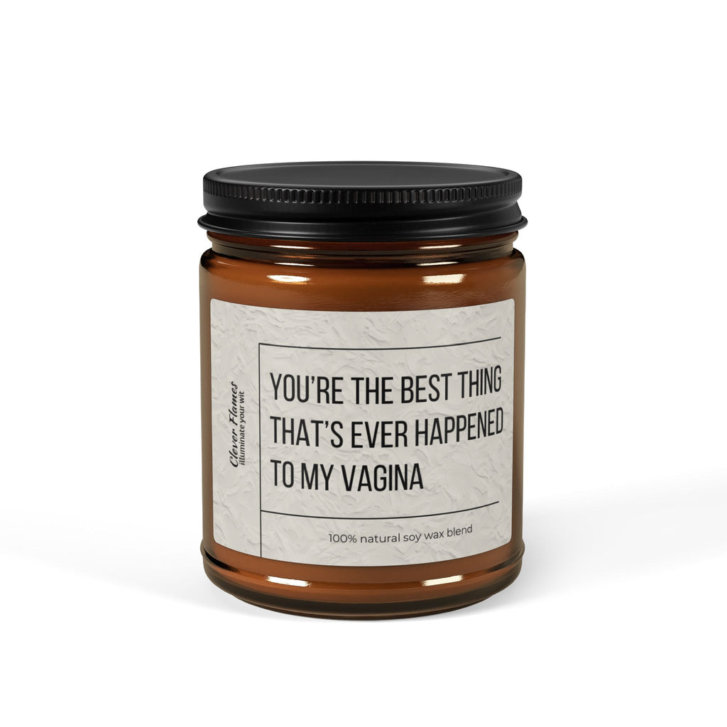 The Printify Best Thing Thats Ever Happened To My Vagina Sex Candle features a whimsical label and comes in a brown glass jar with black lid. Infused with the enticing aroma of Christmas Warmth, this 100% natural soy candle creates a cozy ambiance for any special occasion.