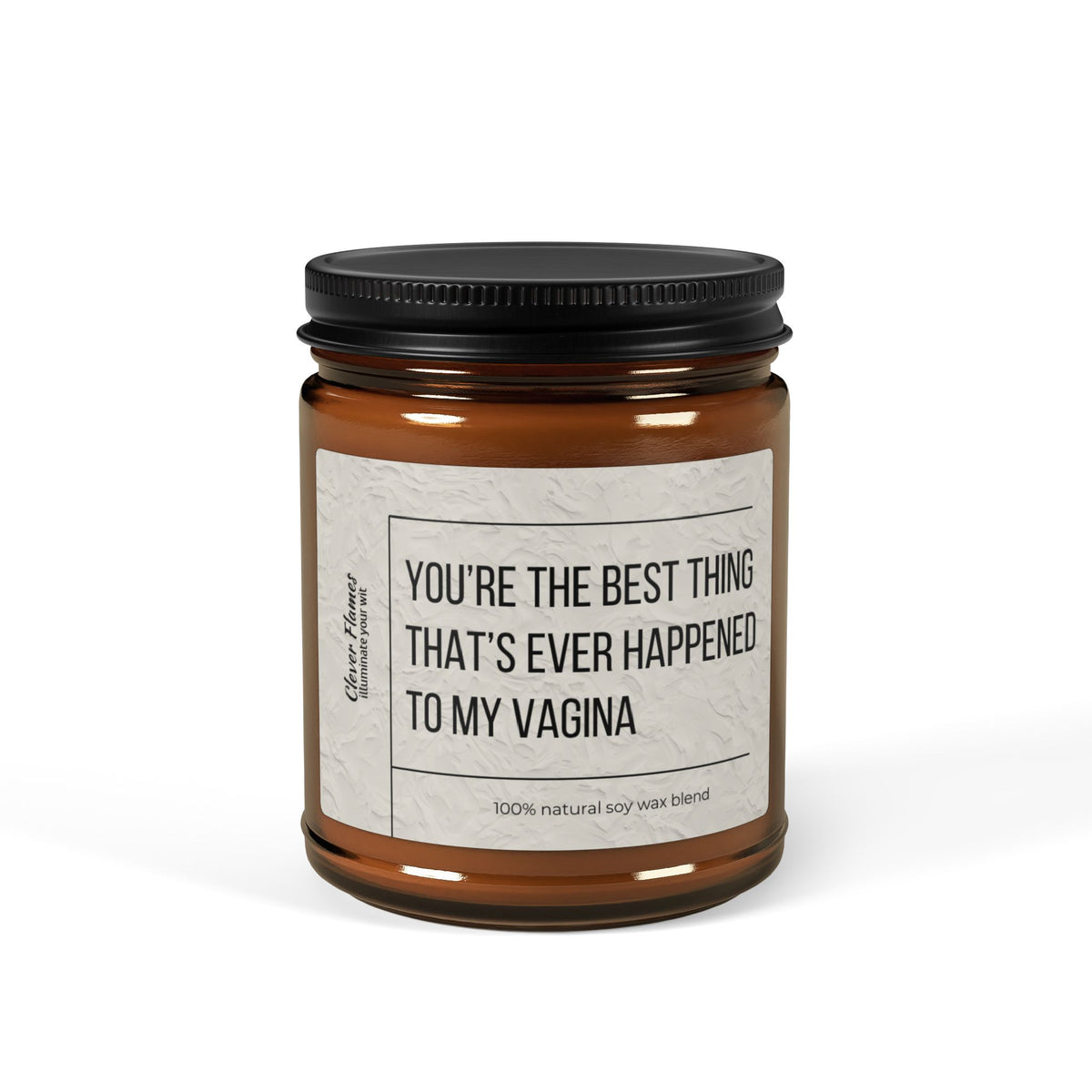 The Printify Best Thing Thats Ever Happened To My Vagina Sex Candle features a whimsical label and comes in a brown glass jar with black lid. Infused with the enticing aroma of Christmas Warmth, this 100% natural soy candle creates a cozy ambiance for any special occasion.