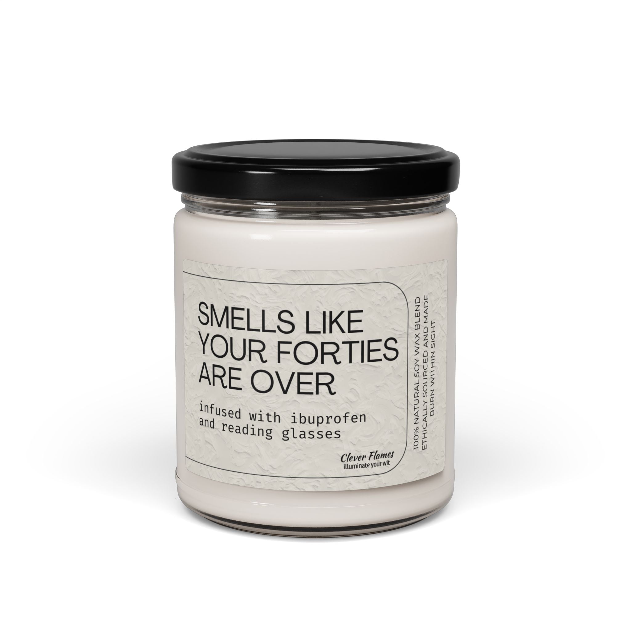 Printify's 50th Birthday Candle Gift, "Smells Like Your Forties Are Over," is a white soy wax candle in a glass jar with a black lid—a funny milestone birthday gift for turning 50.
