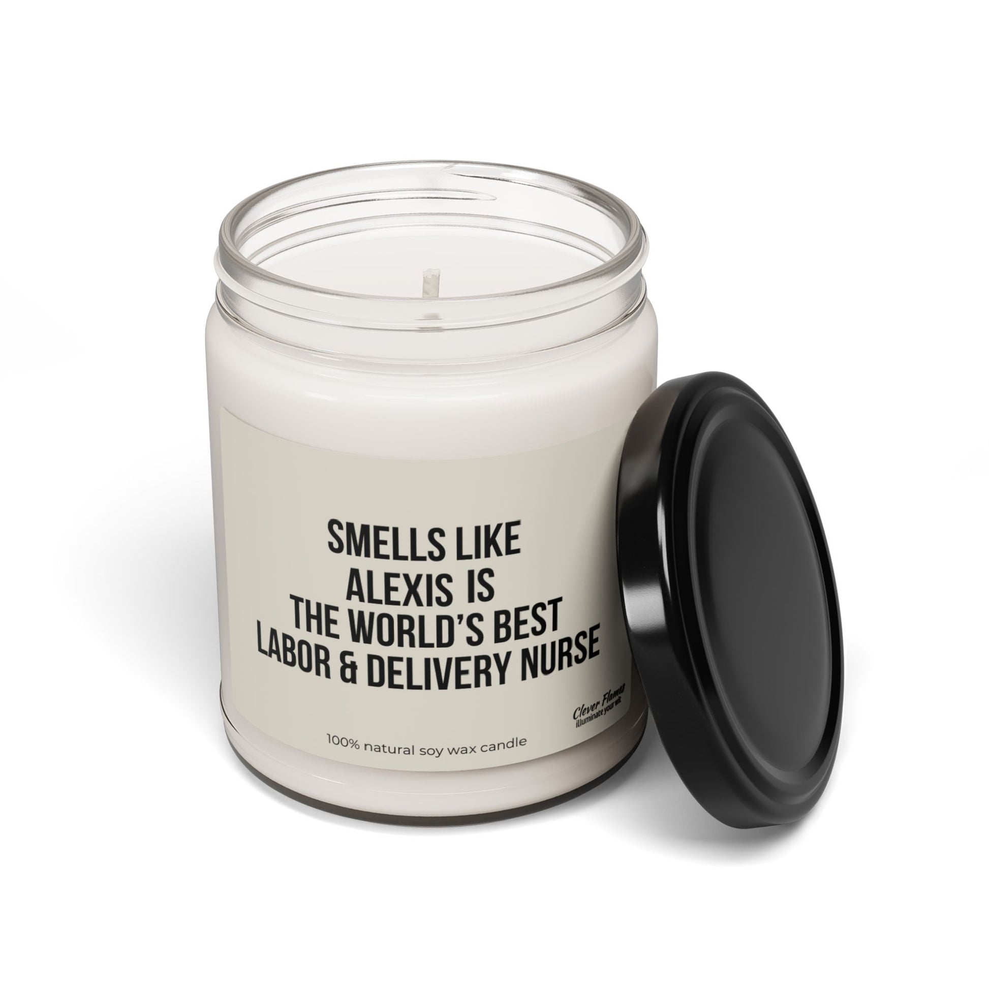 Crafted by Printify, the Custom Labor and Delivery Nurse Candle is a personalized gift made from white soy wax in a glass jar. It proudly features the message "Smells like Alexis is the world's best labor & delivery nurse." Accompanied by a nearby black lid, it serves as an ideal thank you gift for any deserving healthcare hero.