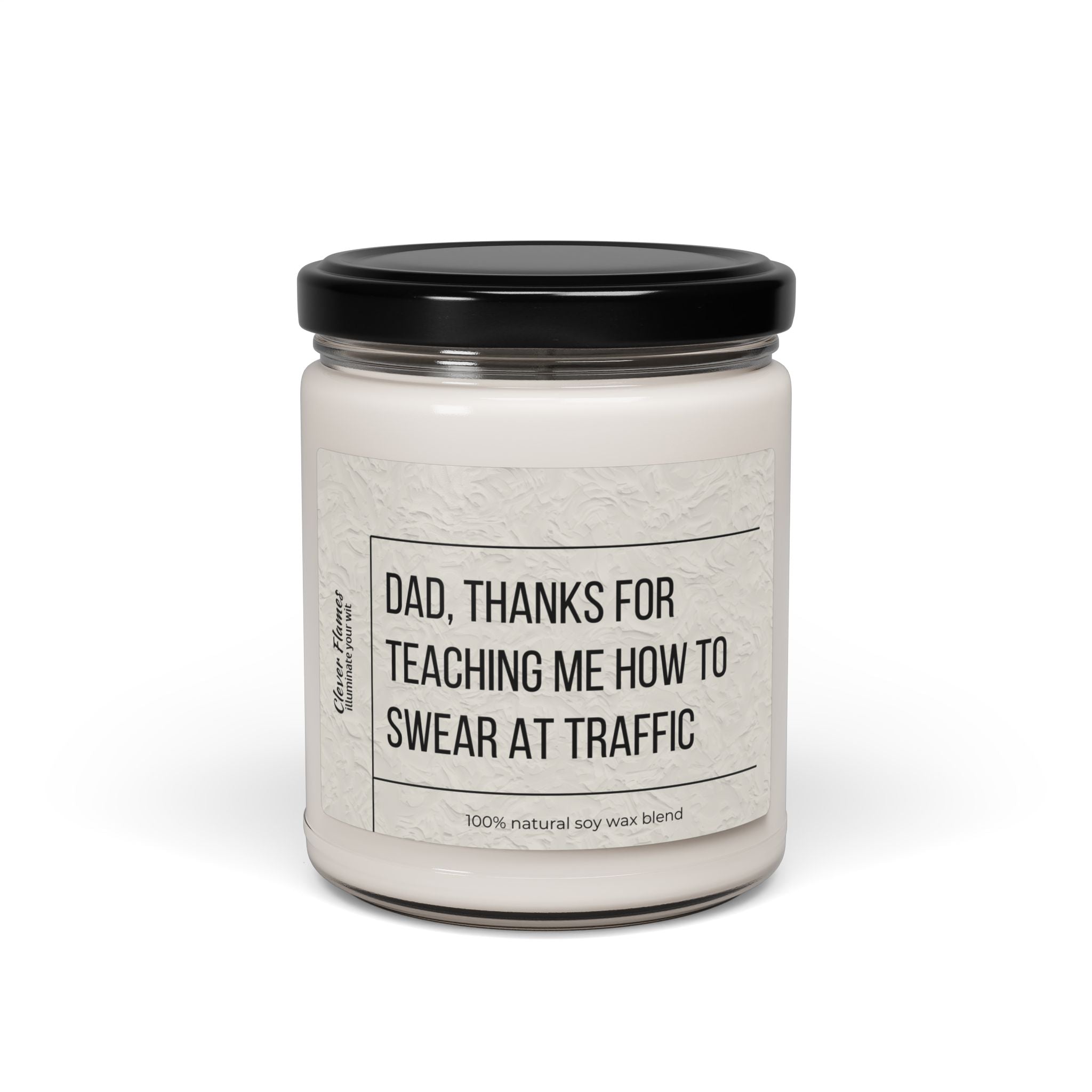 The Printify Funny Fathers Day Candle features a white soy wax blend in a reusable glass jar with black lid and reads, Dad, thanks for teaching me how to swear at traffic—a perfect gift from daughter or son for fun-loving dads.