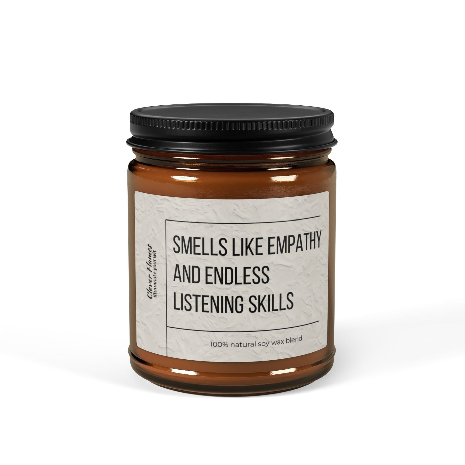 The Counselor Candle by Printify comes in a brown glass jar with a black lid, showcasing the humorous label "Smells Like Empathy & Endless Listening Skills." This candle, made from an eco-friendly, 100% natural soy wax blend, is perfect for creating a cozy Christmas atmosphere in any room. A thoughtful gift for therapists, social workers, and mental health professionals.
