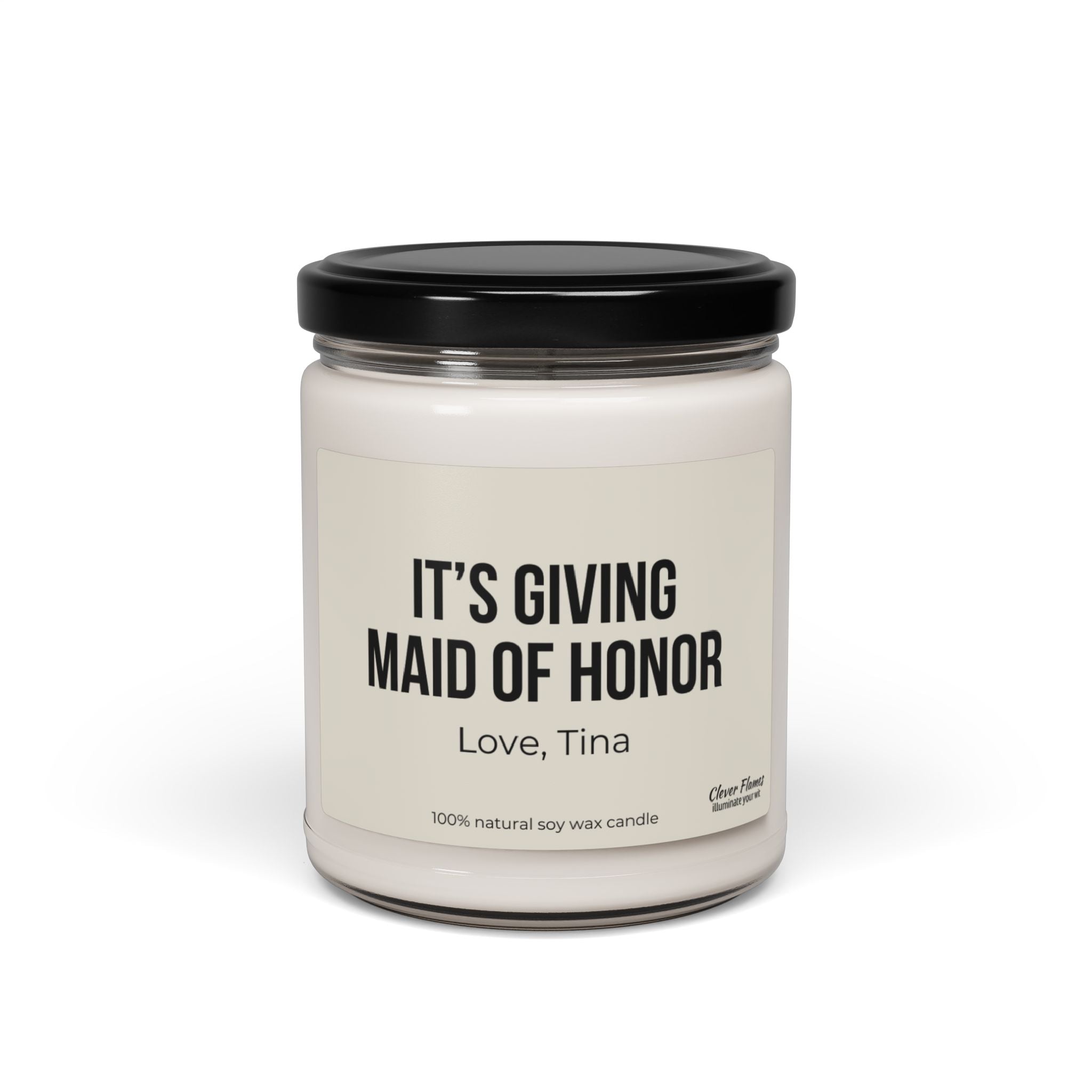 This custom soy wax candle by Wedding, featuring a white jar with a black lid, is the perfect gift for a maid of honor. The label says "ITS GIVING MAID OF HONOR, Love, Tina," making it an ideal choice for bridal party celebrations.