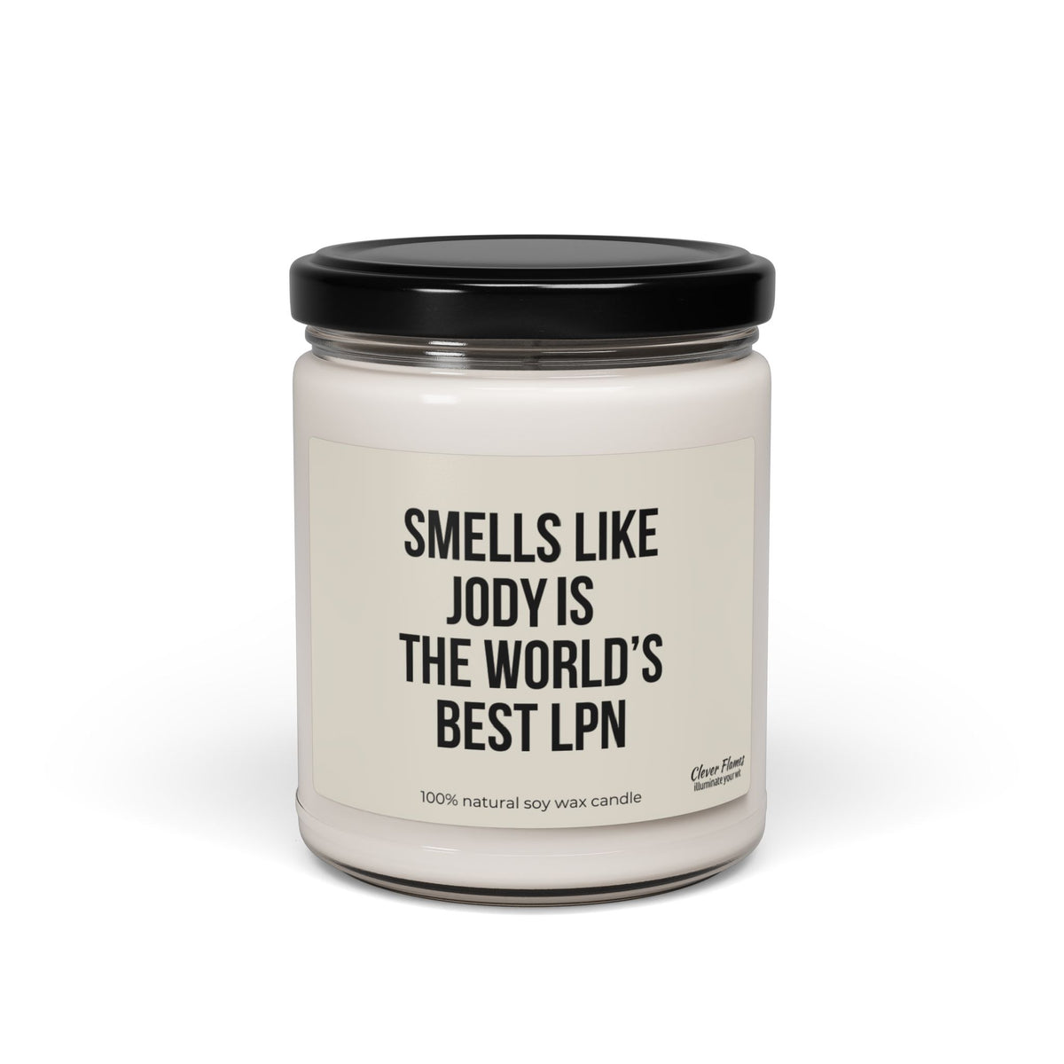 A white candle made from 100% natural soy wax comes in a glass jar with a black lid, featuring a label that reads, "Smells like the World's Best LPN." This personalized soy candle is an ideal gift option for nurses or those graduating as LPNs, offered by Printify.