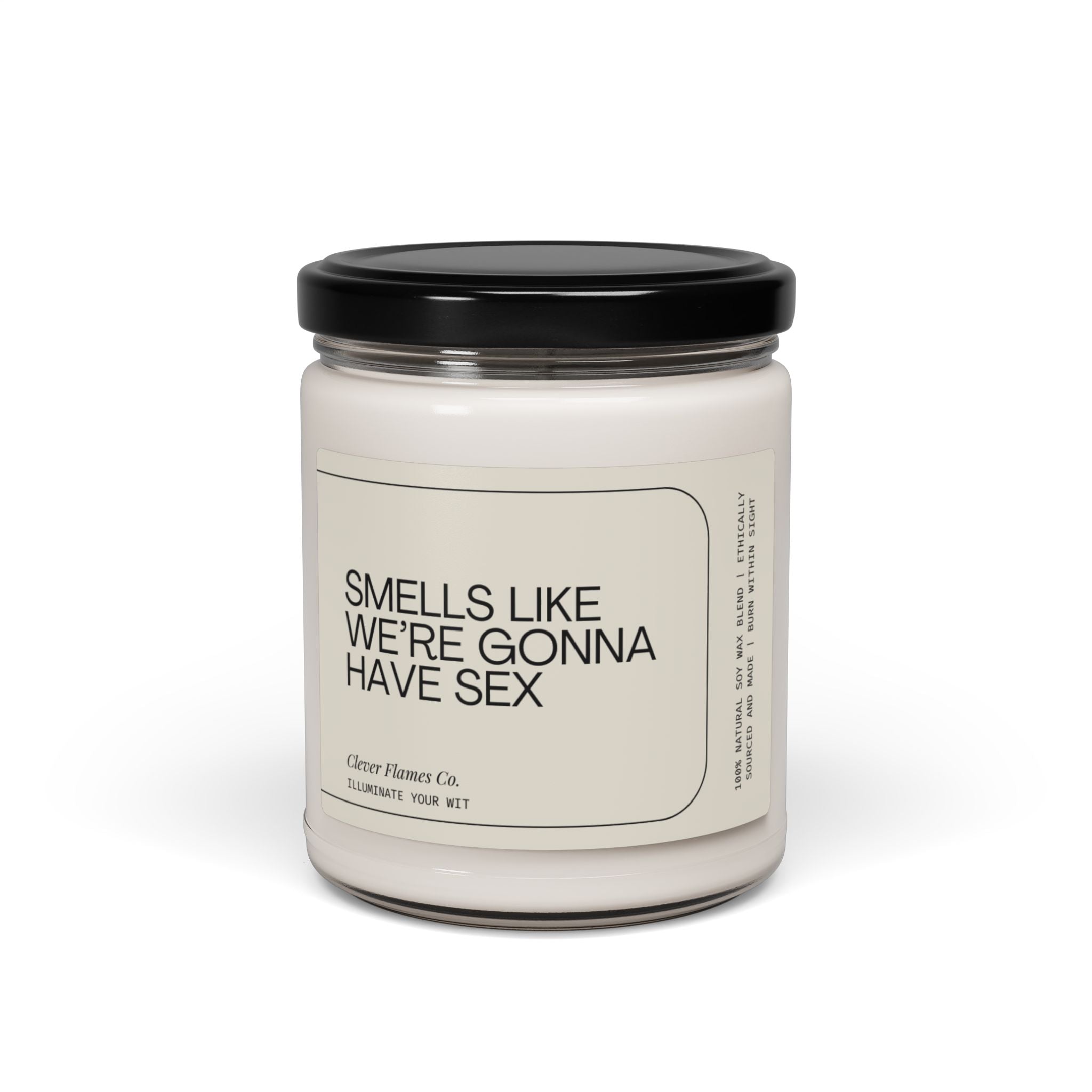 A distinct candle jar with a black lid, labeled boldly with "Smells Like We're Gonna Have Sex", is made from natural soy wax. This special product by Printify serves as the ideal romantic gift.