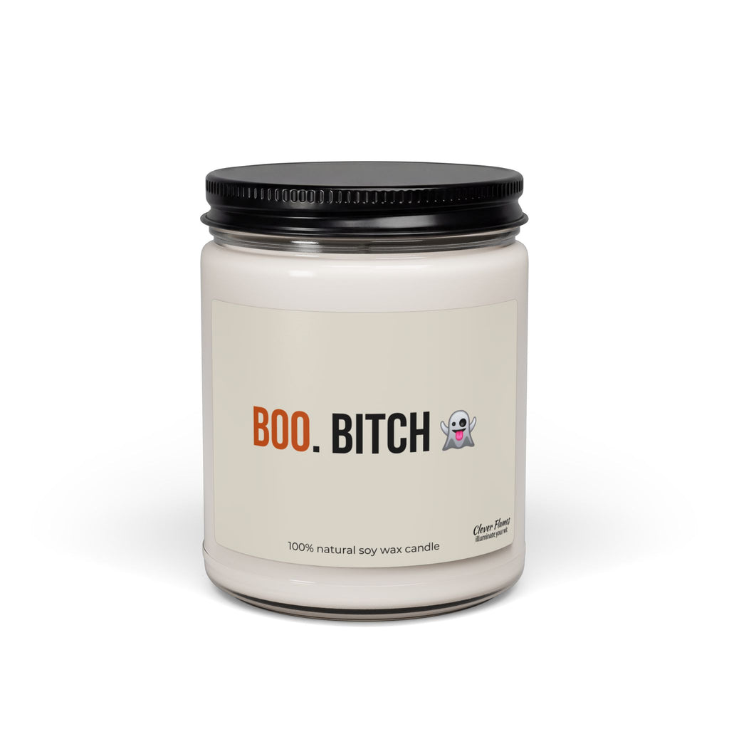 Introducing the Printify Funny Halloween Fall Candle Decor—a quirky autumn decoration or party favor perfect for adding spooky charm to your space. This white scented soy candle comes in a glass jar with a black lid, featuring a playful label that reads “BOO. BITCH” alongside a ghost emoji and “100% natural soy wax candle” underneath. This sarcastic and fun gift is ideal for her or your bestie friend, making it a unique choice as Halloween decor or a cheeky autumn present.