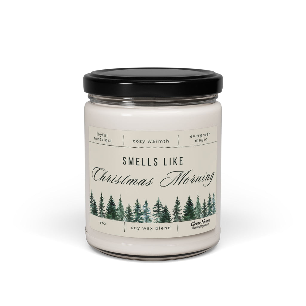 The Printify Smells Like Christmas Morning – Holiday Soy Candle (9oz) in a glass jar with black lid features a festive label with evergreen trees, evoking joyful nostalgia, cozy warmth, and holiday magic.