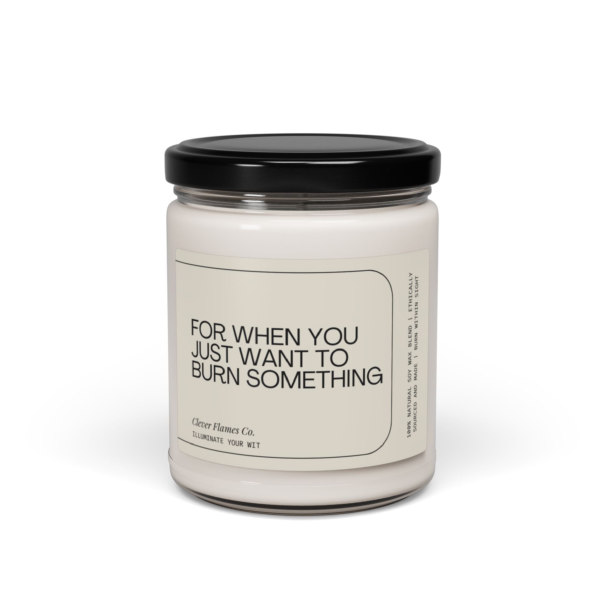 Crafted from natural soy wax, the "For When You Just Want To Burn Something Spiritual Candle" by Printify comes in a glass jar with a black lid. The label humorously reads, "For when you just want to burn something," and includes a witty note, "Immerse Your Wit." Featuring a cotton wick, this candle maintains a simple and minimalist design for a clean burn.