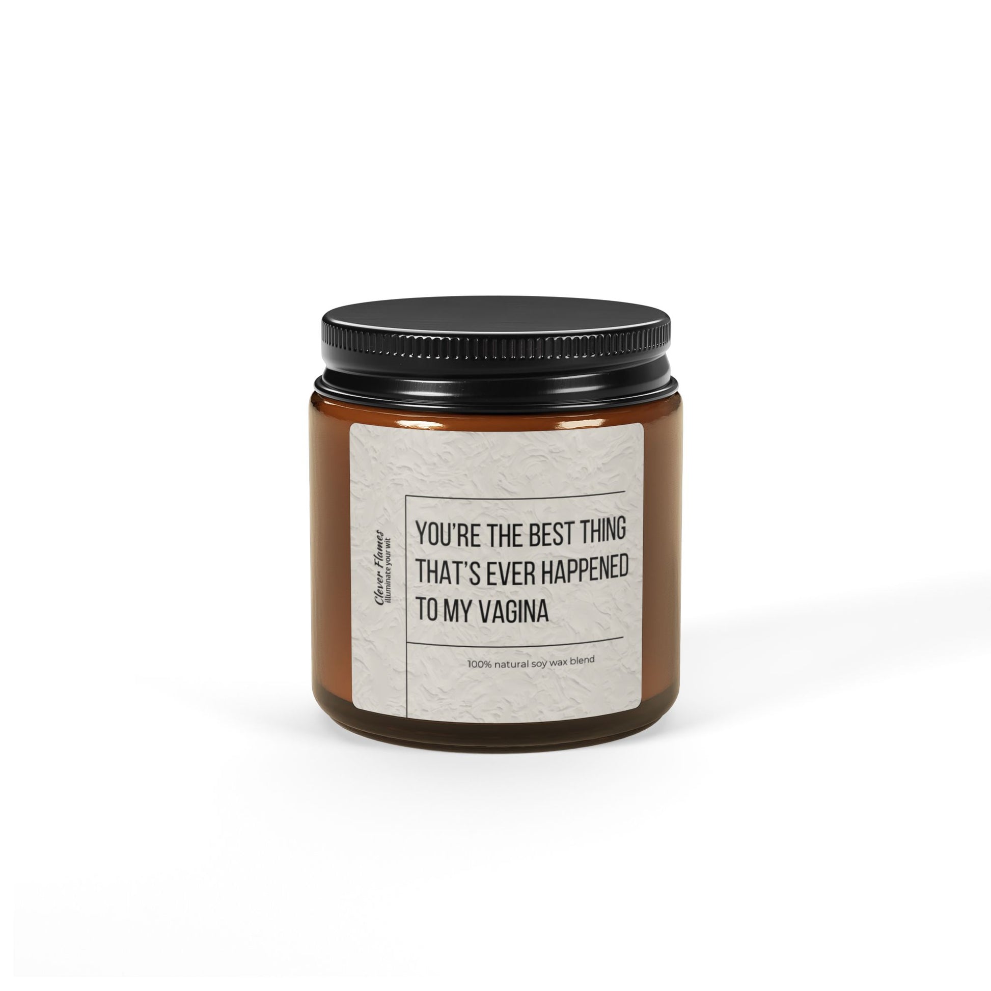 Printifys Best Thing Thats Ever Happened To My Vagina Sex Candle is a brown jar soy candle with a black lid adorned with a playful label. It exudes Christmas Warmth, offering a cozy and natural experience perfect for Valentines Day or gifting your special someone.