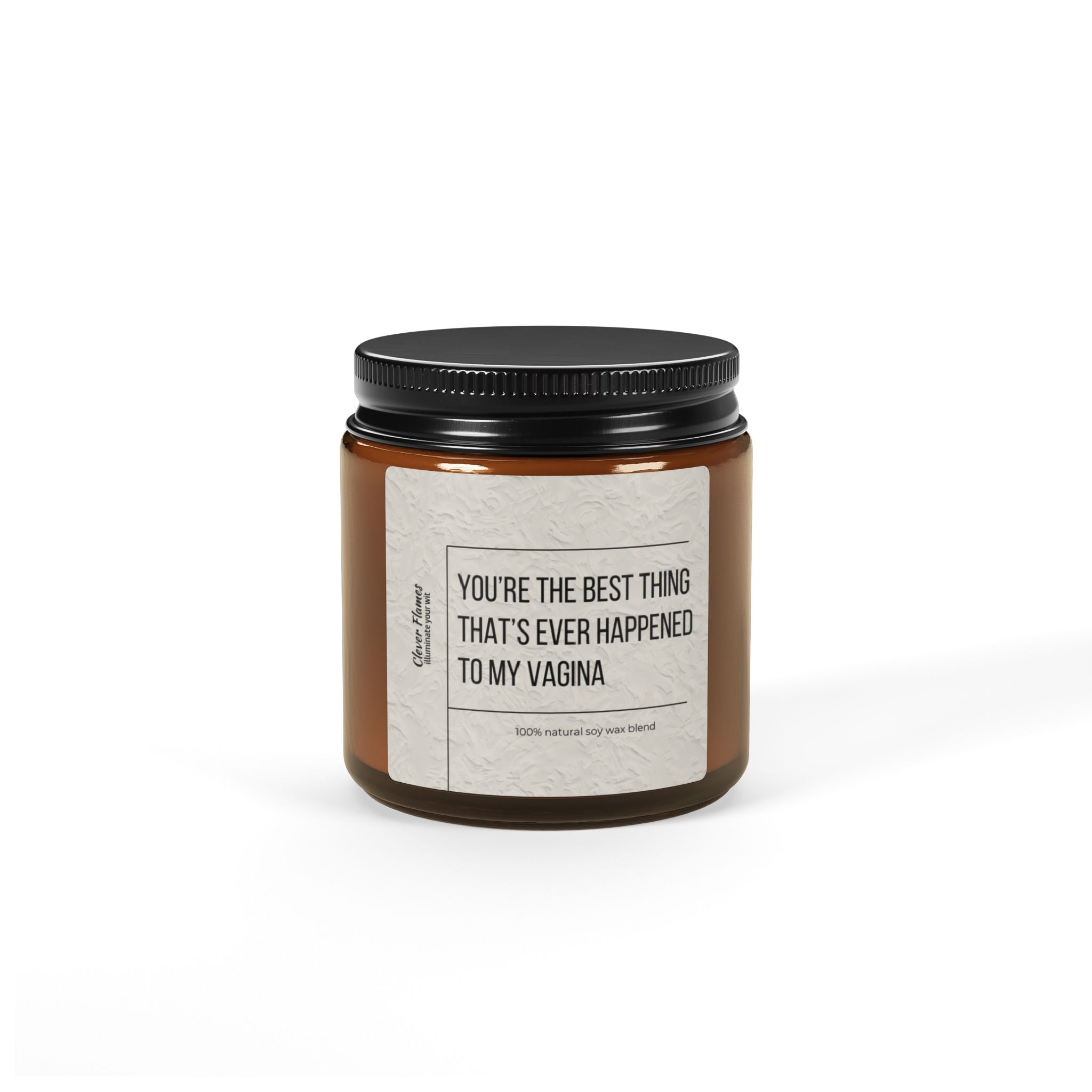 Printifys Best Thing Thats Ever Happened To My Vagina Sex Candle is a brown jar soy candle with a black lid adorned with a playful label. It exudes Christmas Warmth, offering a cozy and natural experience perfect for Valentines Day or gifting your special someone.