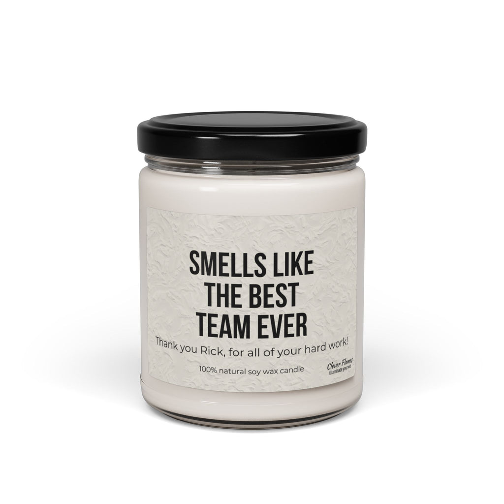 Introducing the Printify Scented Soy Candle, specially designed for corporate gifting. This personalized soy candle, encased in a sleek glass jar with a black lid, features the message "Smells Like the Best Team Ever" on its label—an excellent choice for employee appreciation. Express your gratitude to Rick with a note recognizing his hard work. Made from 100% natural soy wax, this candle is an ideal gift for any organization.