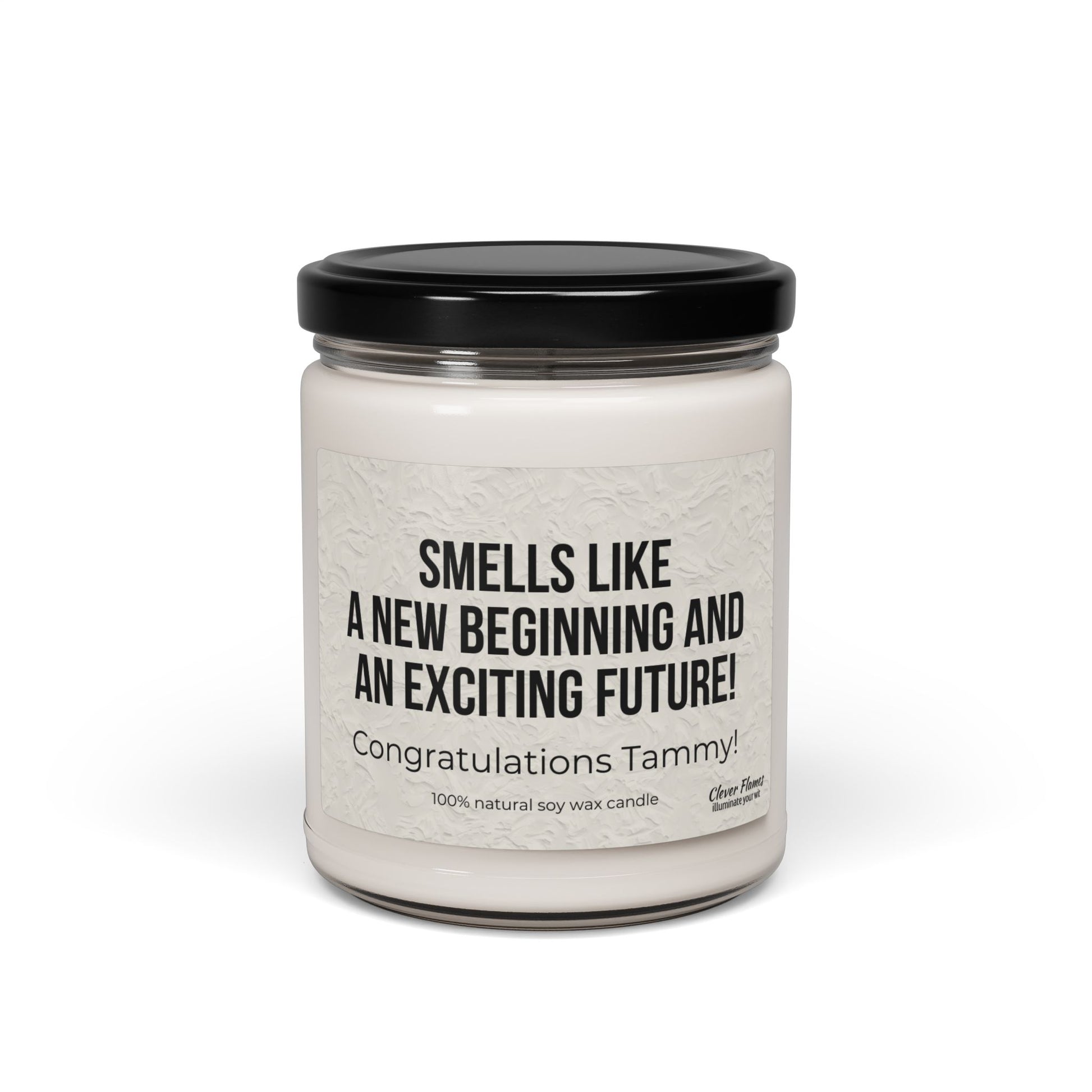 The Printify candle, Smells Like a New Beginning and an Exciting Future, is a white jar with a black lid. Made from 100% natural soy wax, its eco-friendly and perfect for celebrating new jobs or graduations. Personalize the label with Congratulations Tammy! for the ideal new start gift.