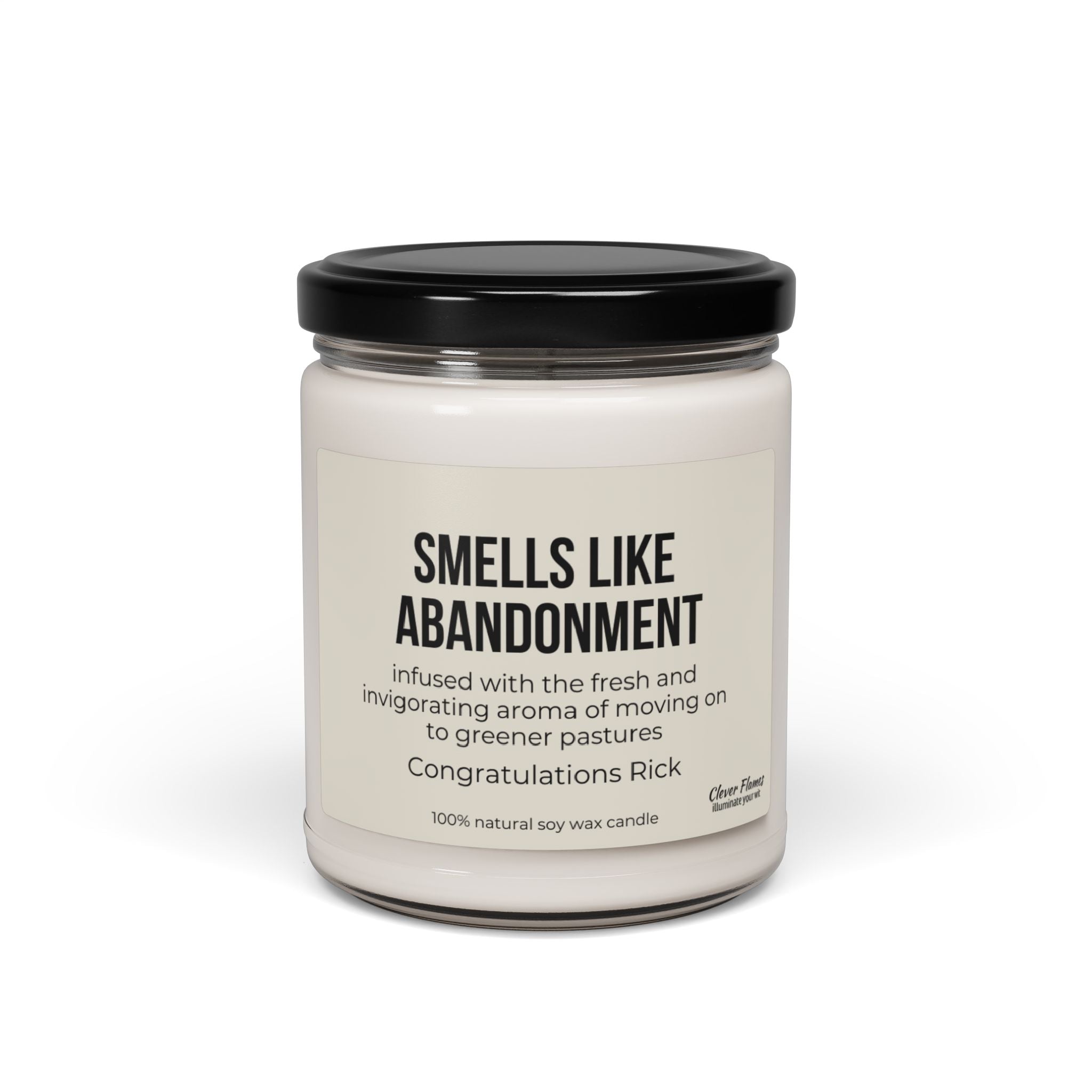 The "Abandonment Candle for Coworker Leaving" by Printify, humorously labeled with "Smells Like Retirement," is infused with aromas of moving on, making it the perfect gift for a departing coworker. The text lightheartedly congratulates Rick and emphasizes that it's crafted from 100% natural soy wax. Featuring a sleek design, it is elegantly finished with a black lid.