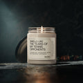 A lit Printify Scented Soy Candle—“Smells Like the Tears of My Tennis Opponents”—infused with cinnamon vanilla, sits in a glass jar with its eco-friendly lid beside it. The perfect fun gift for tennis lovers.
