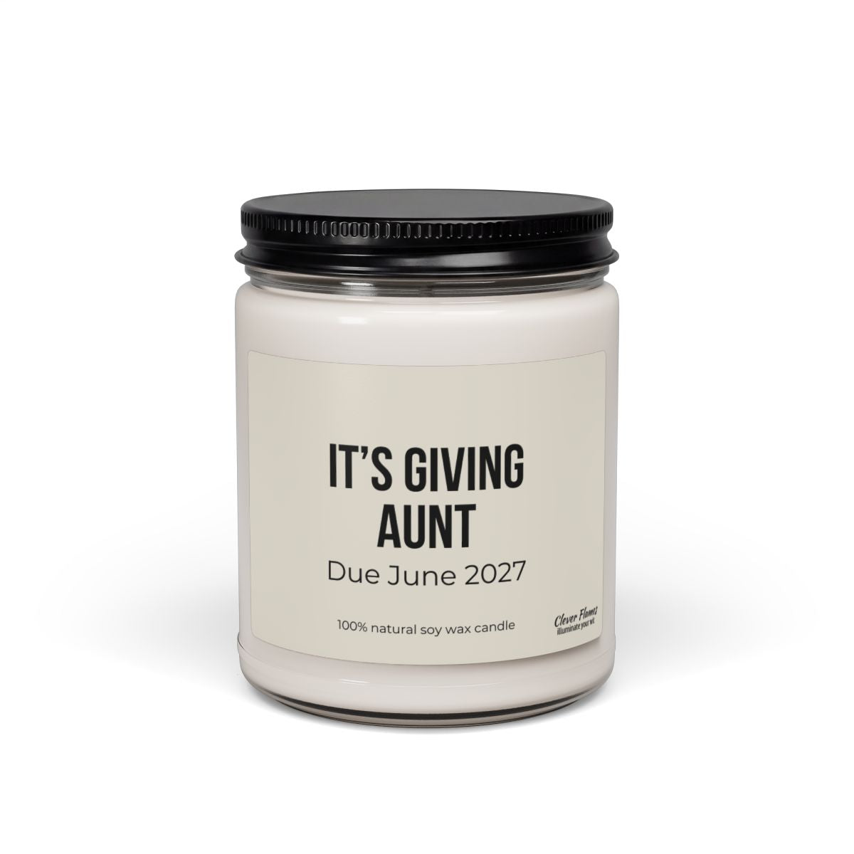 A 9oz white candle jar with a black lid from Printify features a label that reads: ITS GIVING AUNT, Due June 2027, and is made from 100% natural soy wax. This Personalized Aunt Baby Announcement Candle makes the perfect pregnancy reveal gift for an aunt-to-be, offering a stylish way to share your special news.