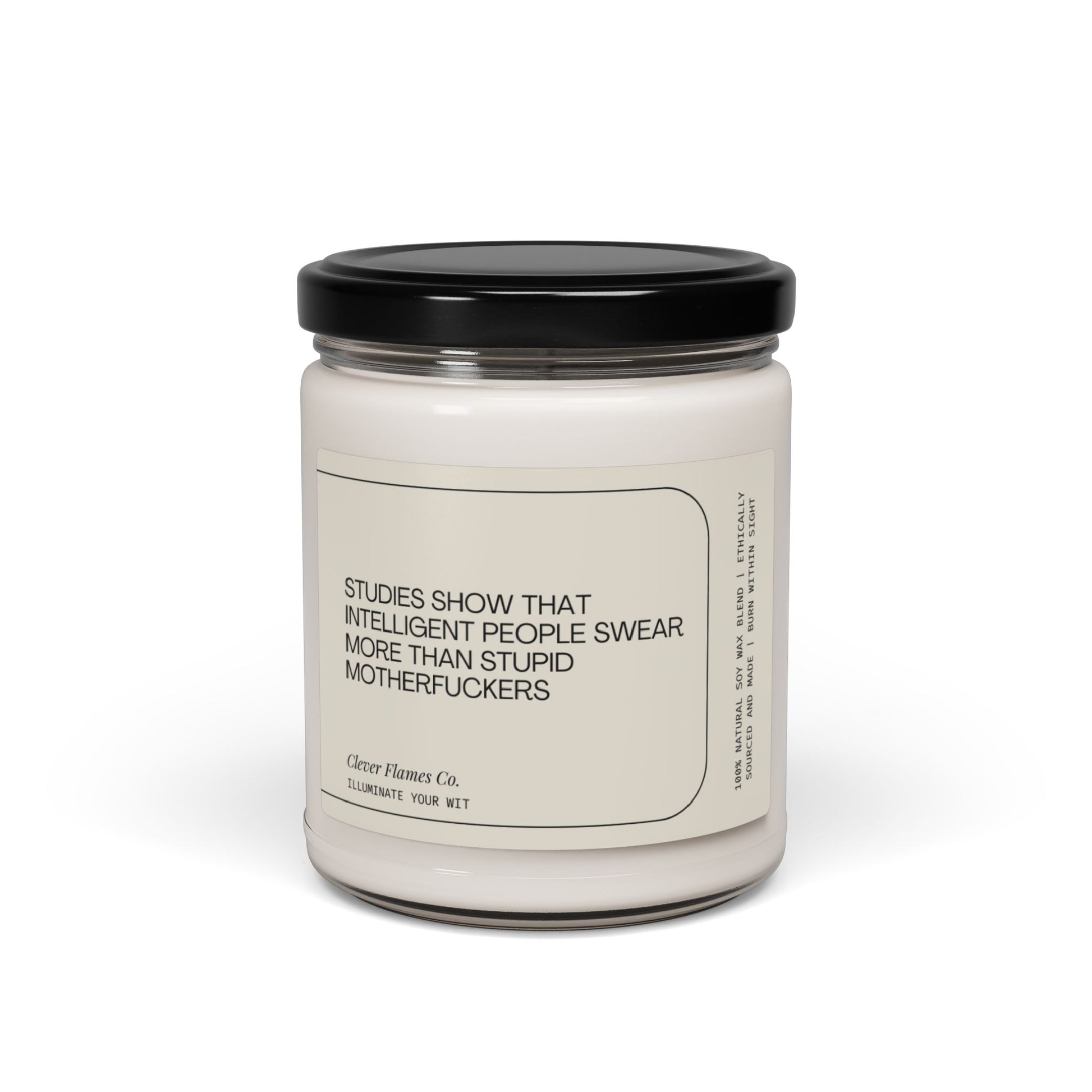 A quirky scented candle in a glass jar with a black lid from Printify, featuring the label "Studies Have Shown That Intelligent People Swear More than...". Crafted from natural soy wax, this funny gift candle is perfect for illuminating your wit.