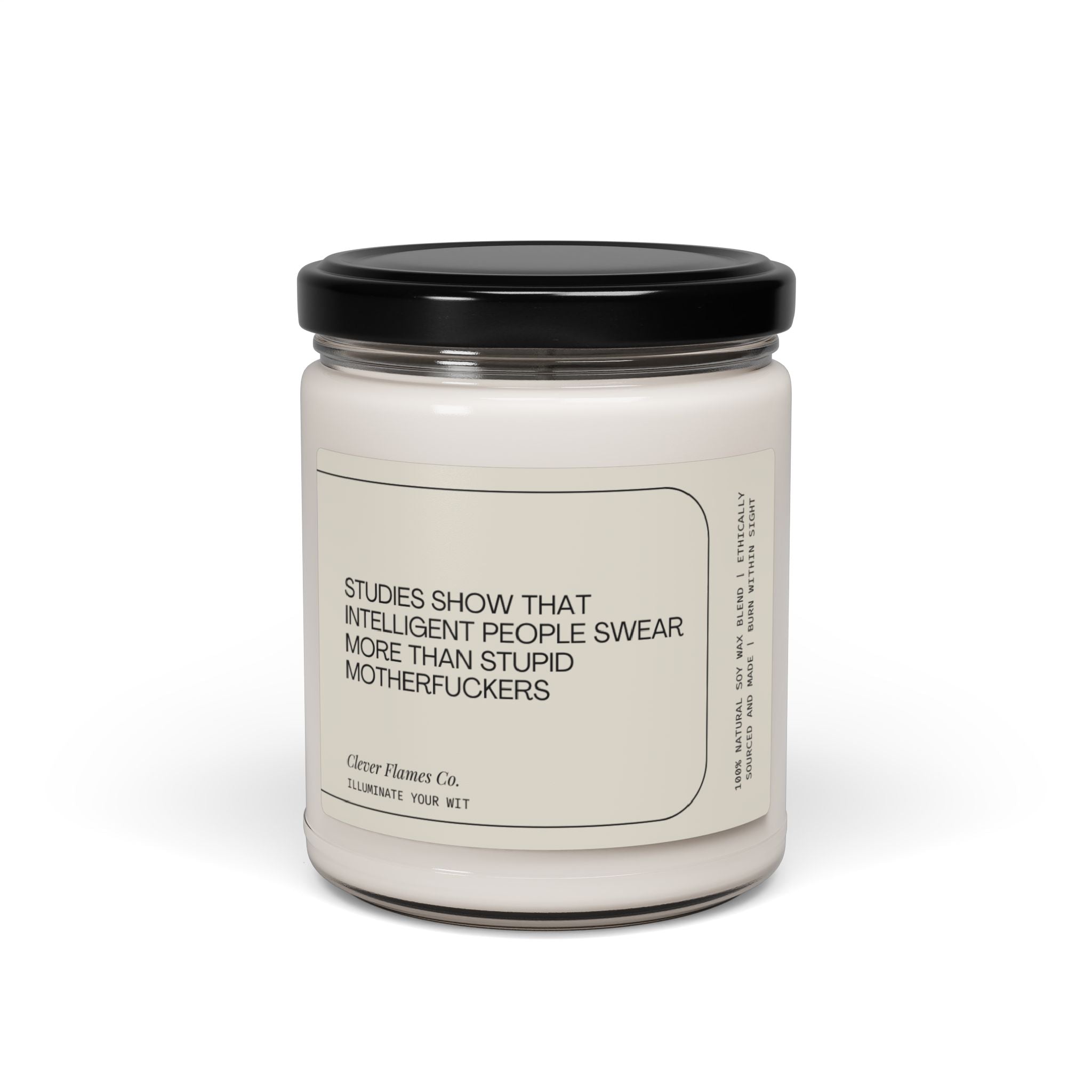 A quirky scented candle in a glass jar with a black lid from Printify, featuring the label "Studies Have Shown That Intelligent People Swear More than...". Crafted from natural soy wax, this funny gift candle is perfect for illuminating your wit.