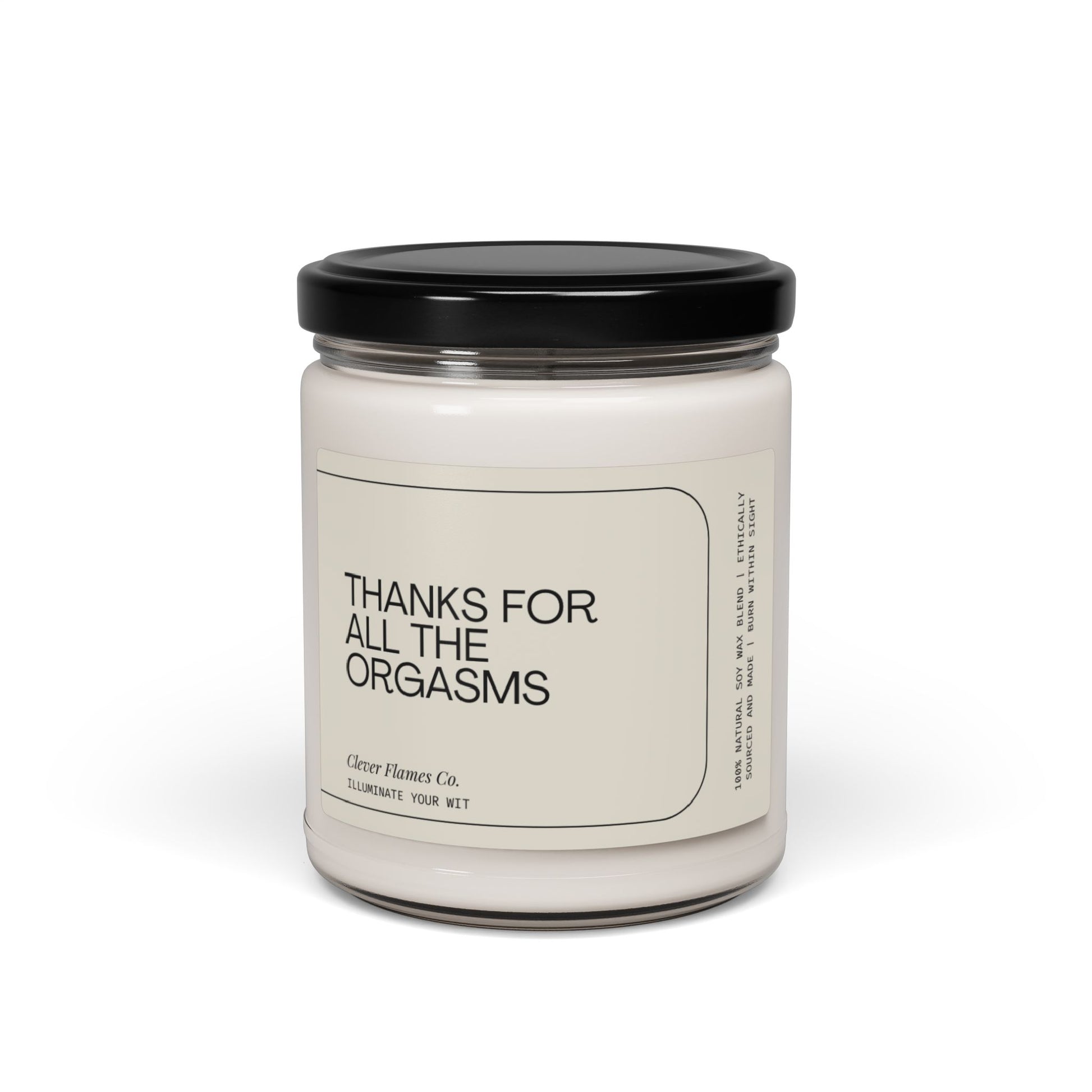 This soy wax candle from Printify comes in a glass jar with a black lid. The label reads "Thanks For All The Orgasms," offering an exquisite personalized gift option for her, him, or anyone special. Its minimalist design features black text on a light background, making it an elegant choice for various occasions like Valentine's Day or as a thoughtful relationship gift.
