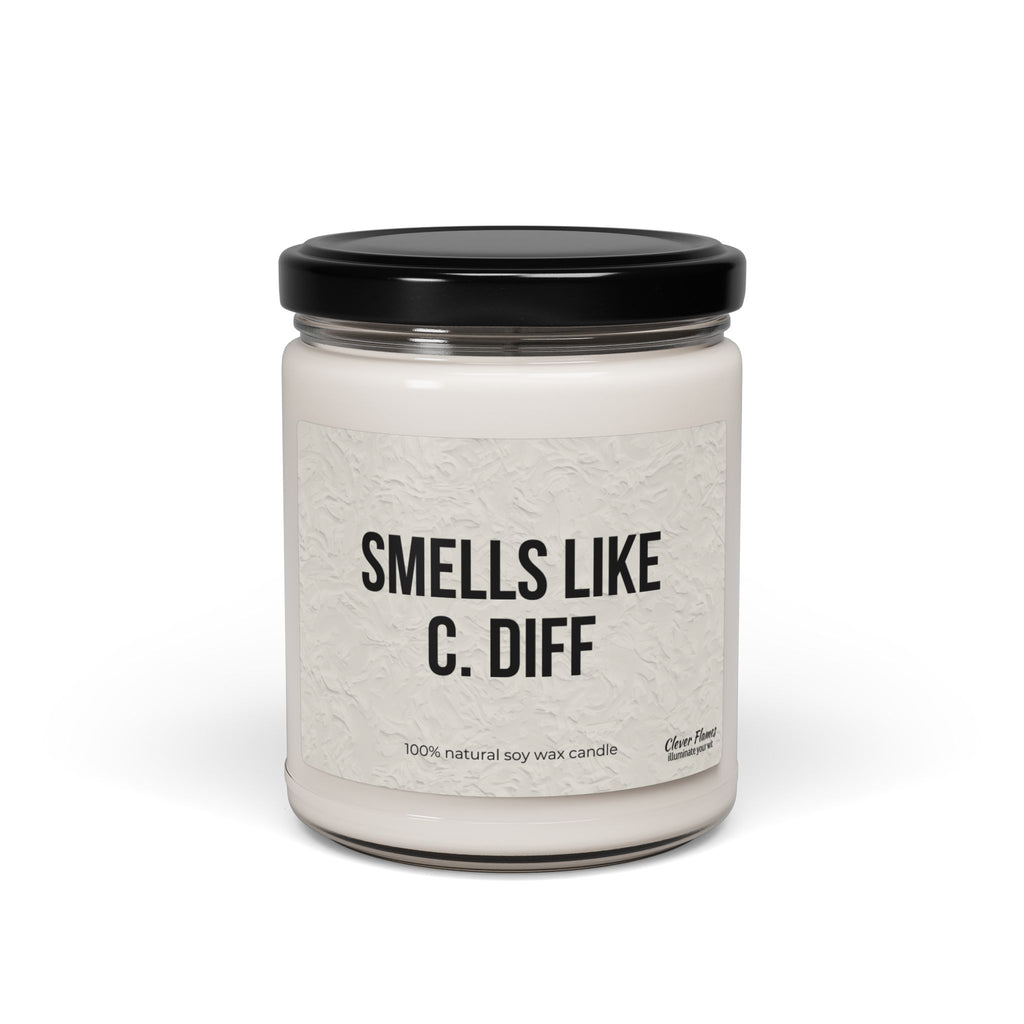 The Printify Smells Like C. Diff candle is a soy wax candle in a glass jar with a black lid, ideal for nurse gifts. Featuring medical humor, this funny gift for healthcare workers is sure to spark laughter and conversation.
