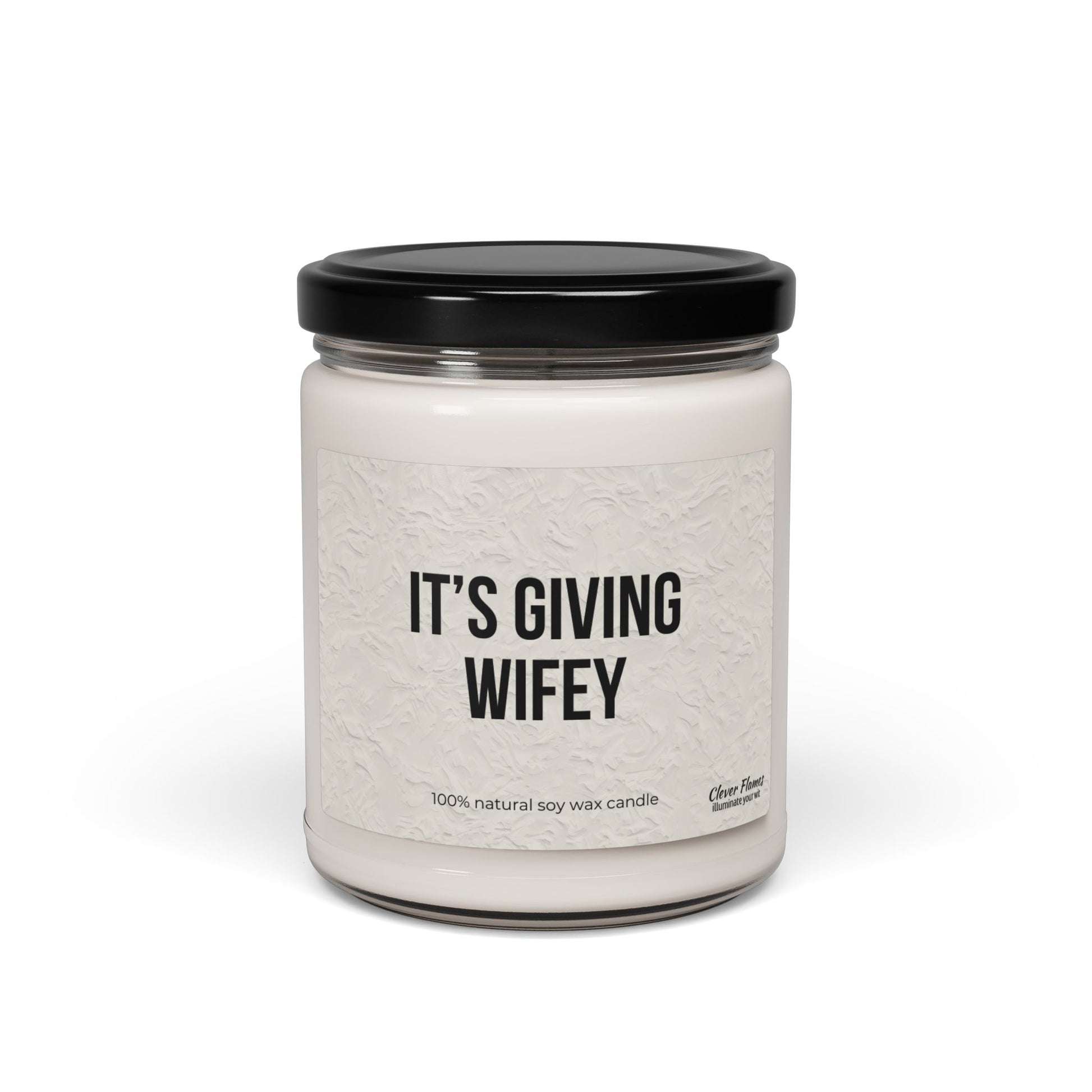 Printifys Its Giving Wifey candle, made from natural soy wax in a clear glass jar with a black lid, is the perfect engagement gift.