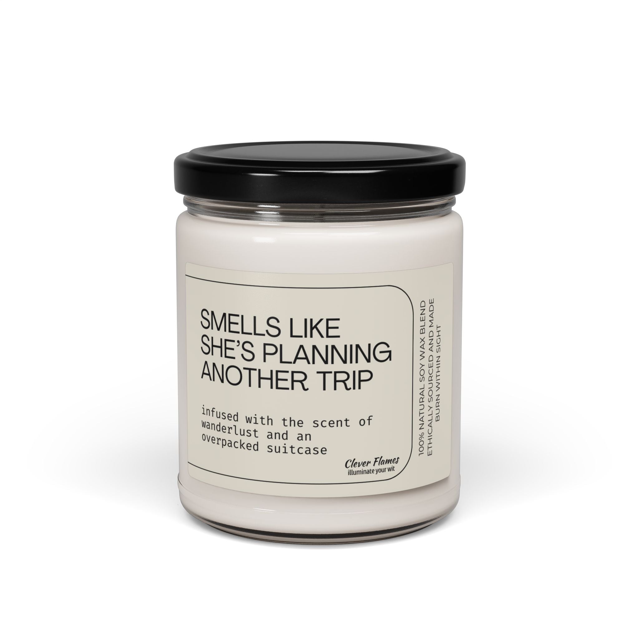 The Printify "Smells Like She's Planning a Trip" Soy Candle, 9oz, comes in a glass jar with a black lid and label inspired by wanderlust—perfect for travel lovers and makes a thoughtful gift.