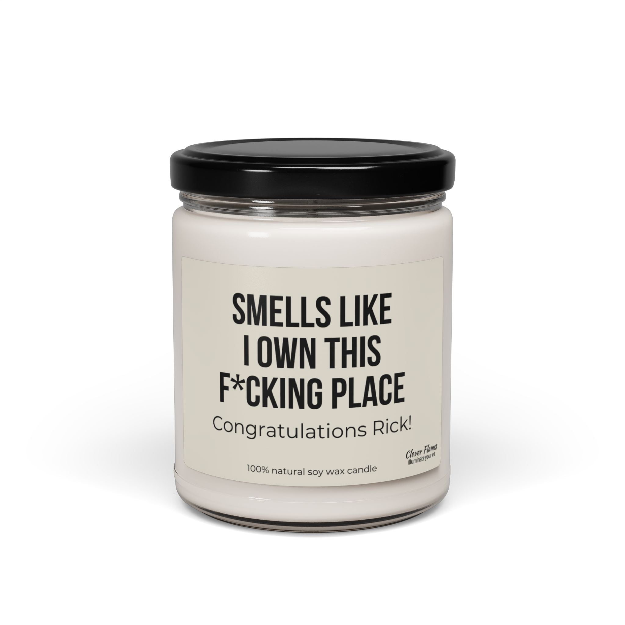 A perfect gift for new homeowners, this white jar candle with a black lid is sure to make any housewarming occasion memorable. The label boldly states, "Smells like I own this f*cking place." Congratulations, Rick! Crafted by Printify, this 100% natural scented soy candle from the collection "Smell Like I Own This Place Scented Soy Candle Housewarming Gift" adds a touch of humor and warmth.