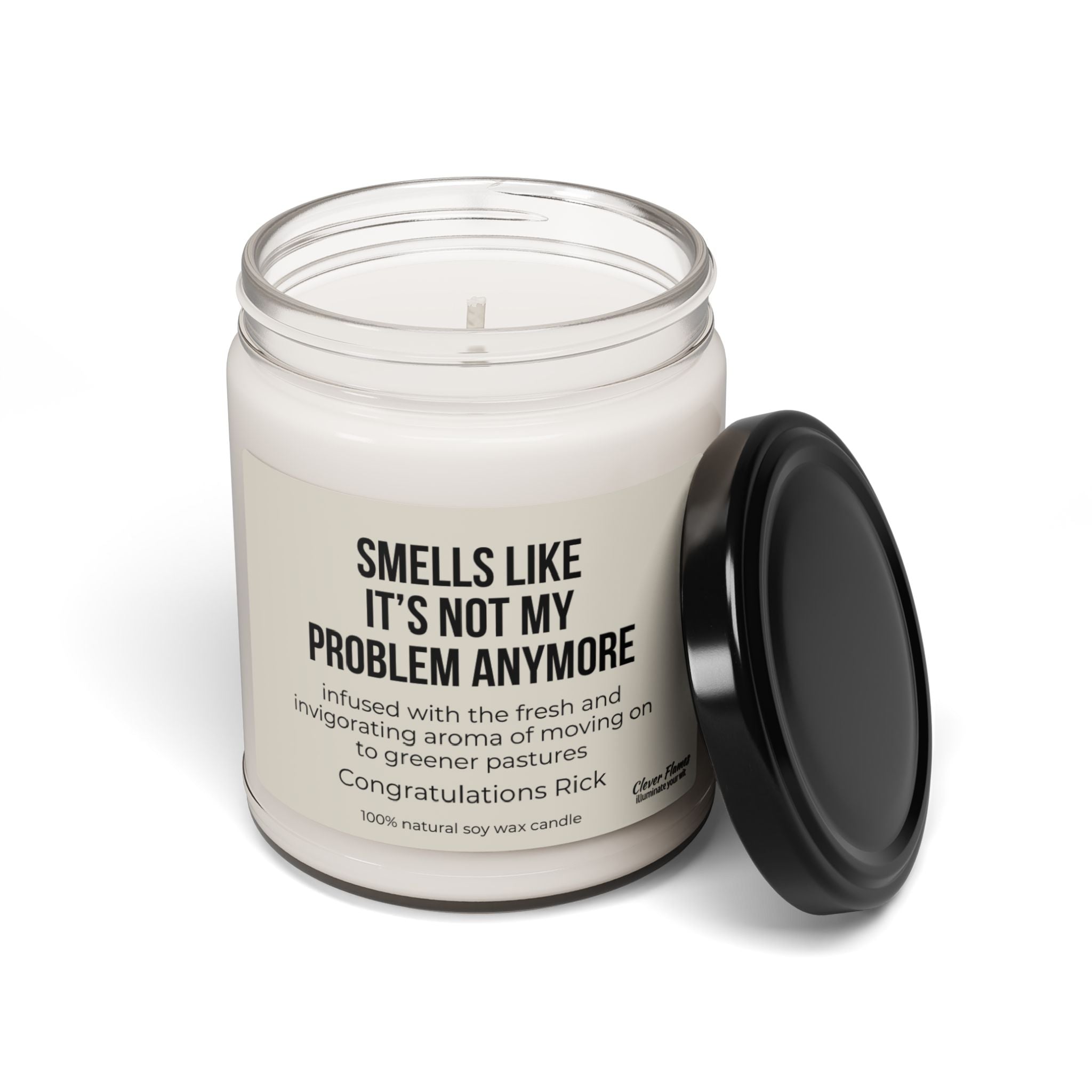 Here's a humorous retirement candle from Printify with the name "Smells Like It's Not My Problem Anymore," which is an ideal personalized gift for Rick. This soy candle comes in a glass jar and exudes a fresh aroma reminiscent of greener pastures, complete with a playful congratulatory message. The lid sits beside it, making it the perfect funny goodbye gift for someone retiring.