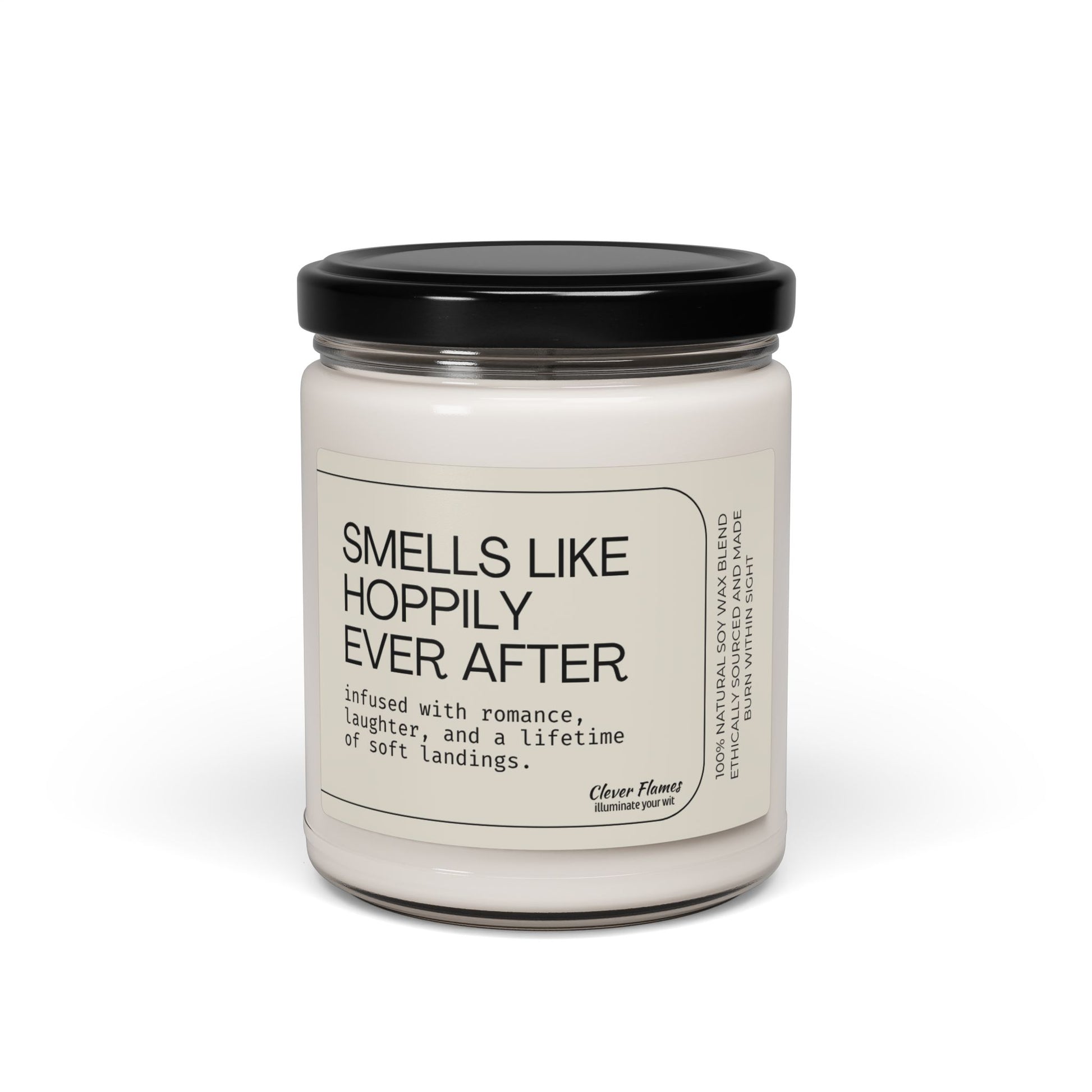 The Smells Like Hoppily Ever After Candle by Clever Flames, from Printify, is a white vegan soy wax candle in a glass jar with a black lid—perfect as a funny, romantic wedding or anniversary gift for couples.
