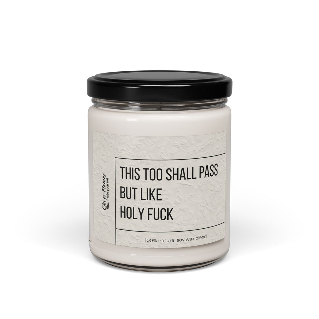 The Printify Humorous Scented Soy Candle, 9oz, features This Too Shall Pass, But Like Holy F*** on a white jar with black lid and label. Made from a 100% natural soy wax blend for unique aromatic experiences every burn.