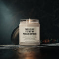 A soy candle from Printify, placed on a dark surface, features the text: "Smells like it's not my problem anymore." Embodying the fresh and invigorating scent of embracing new opportunities, this personalized retirement candle is a humorous farewell gift. Congratulations, Rick!