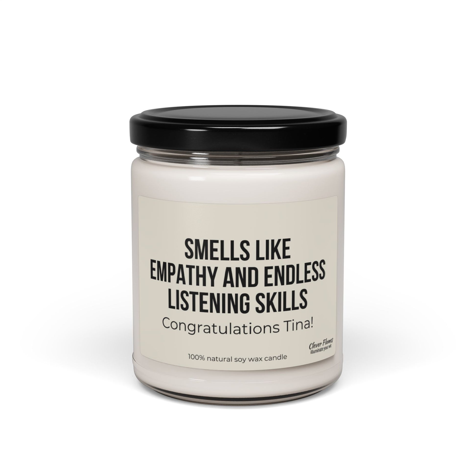 A Printify candle named "Gift For Counselor Gift for Counselor Appreciation Candle For Therapist Thank You Gift for Personalized Appreciation Gift for Therapist" features white soy wax in a clear glass jar with a black lid. The label reads: Smells like empathy and endless listening skills. Congratulations, Tina! This is the perfect personalized candle gift to celebrate compassionate souls.