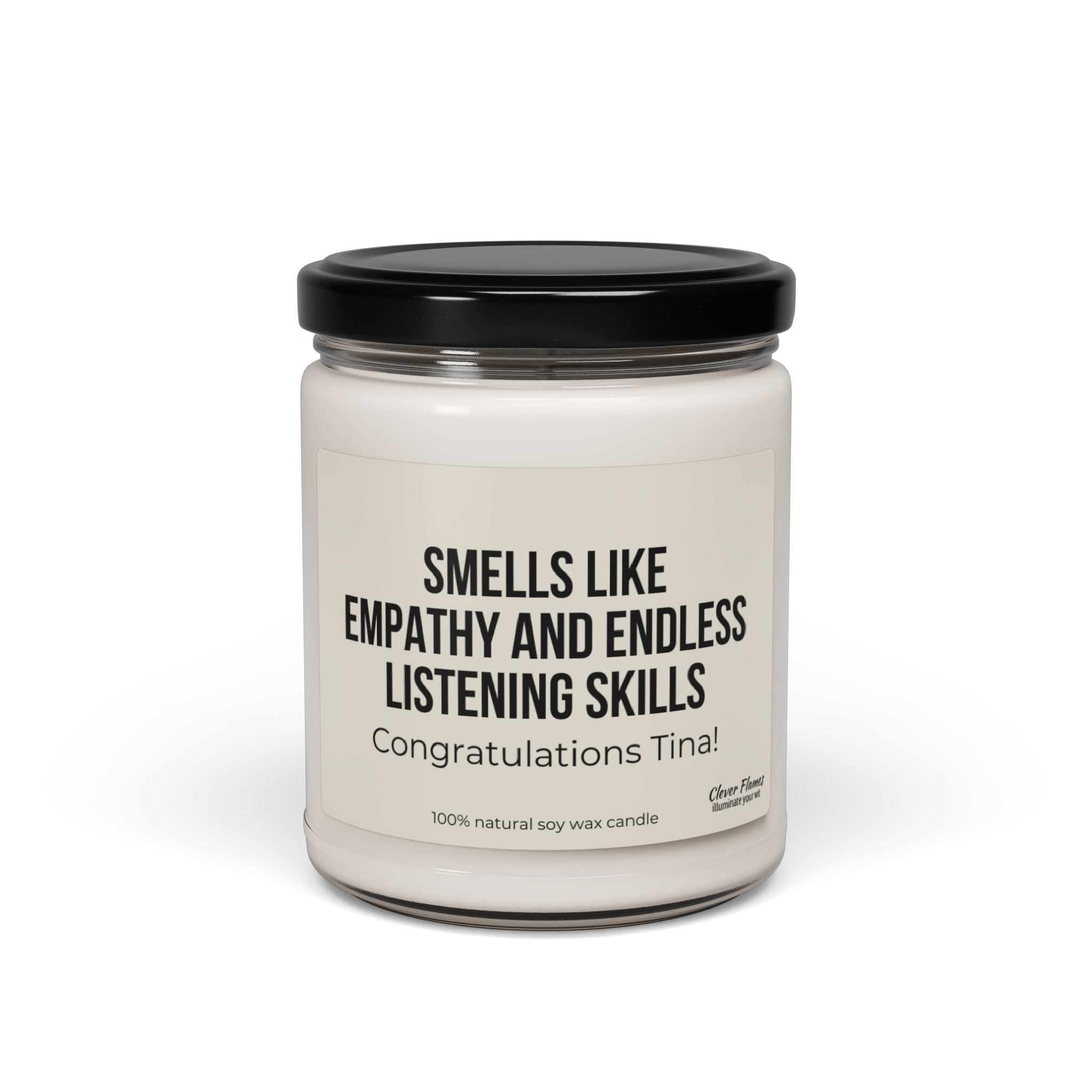 A Printify candle named "Gift For Counselor Gift for Counselor Appreciation Candle For Therapist Thank You Gift for Personalized Appreciation Gift for Therapist" features white soy wax in a clear glass jar with a black lid. The label reads: Smells like empathy and endless listening skills. Congratulations, Tina! This is the perfect personalized candle gift to celebrate compassionate souls.